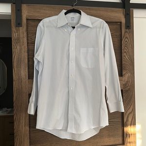 Brooks Brothers light blue pinstripe button down. Excellent condition.